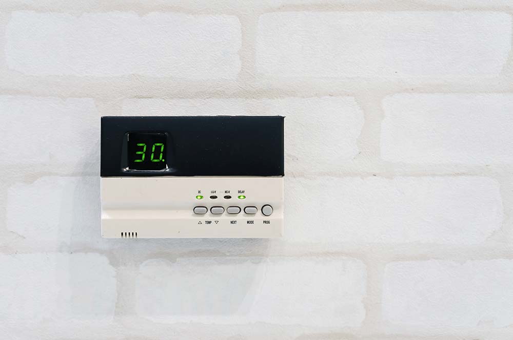 Digital Thermostat on Wall